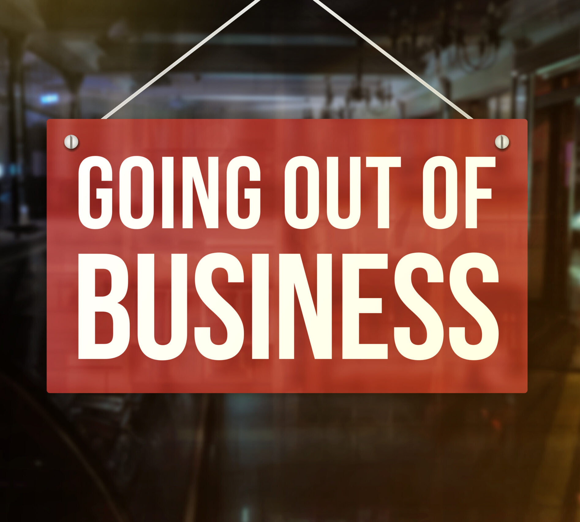 "Going out of business" sign in store window