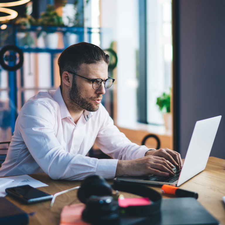 man forming Delaware LLC on his laptop