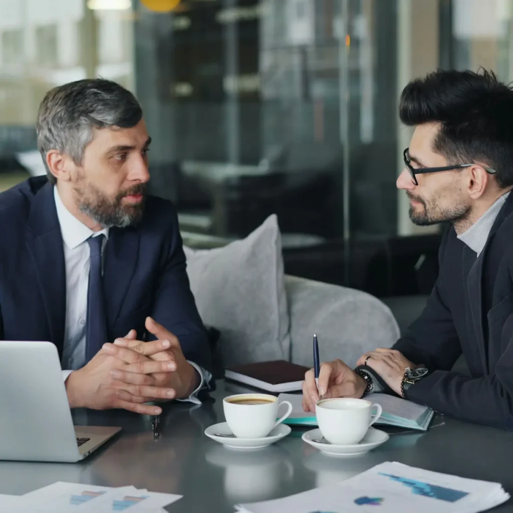 two men in a meeting about their Delaware LLC